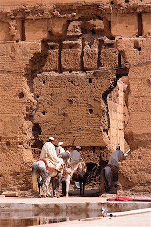 simsearch:700-00555591,k - People Riding Horses Through Opening in Wall, Morocco Stock Photo - Rights-Managed, Code: 700-00555596