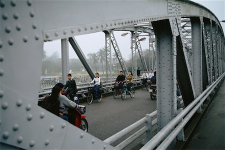 simsearch:700-00554819,k - People Crossing Bridge on Bicycles, Hue, Vietnam Stock Photo - Rights-Managed, Code: 700-00555672