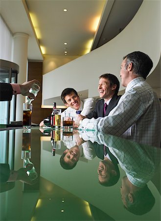 drink beer in suit - Business People at Bar Stock Photo - Rights-Managed, Code: 700-00555852