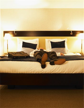 simsearch:700-00606370,k - Businessman Lying on Hotel Bed Foto de stock - Con derechos protegidos, Código: 700-00555887