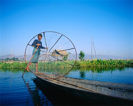 simsearch:862-03807938,k - Man on Boat, Inle Lake, Myanmar Foto de stock - Con derechos protegidos, Código: 700-00556106