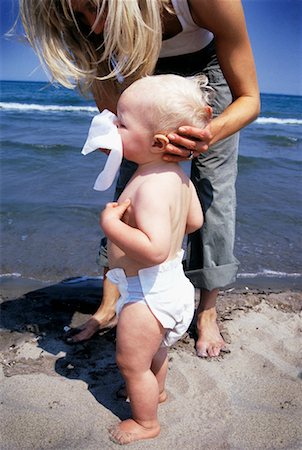 parents with sick baby - Mother Blowing Son's Nose Stock Photo - Rights-Managed, Code: 700-00556218