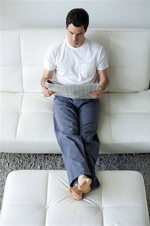 Man Reading Newspaper Stock Photo - Rights-Managed, Code: 700-00556311