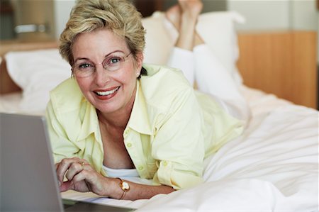Portrait of Woman Using Laptop Stock Photo - Rights-Managed, Code: 700-00556517