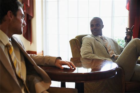 south africa and black and business - Businessmen Talking Foto de stock - Con derechos protegidos, Código: 700-00556578