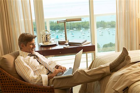 Businessman Using Laptop Stock Photo - Rights-Managed, Code: 700-00557418