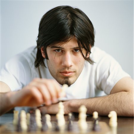 simsearch:700-00042429,k - Man Playing Chess Stock Photo - Rights-Managed, Code: 700-00557536