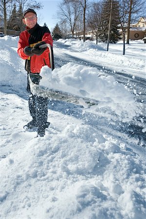 snow shovelling - Man Shovelling Snow, Mississauga, Ontario, Canada Stock Photo - Rights-Managed, Code: 700-00557693