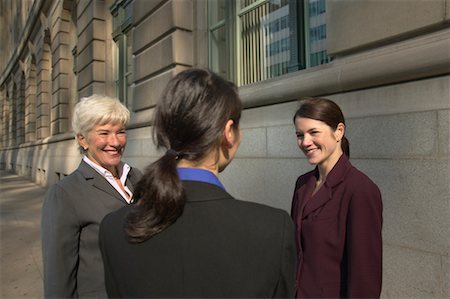 person standing back building street - Group of Businesswomen Talking Outdoors, Toronto, Ontario, Canada Stock Photo - Rights-Managed, Code: 700-00550064