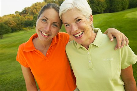 picture of mom and daughter playing golf - Mother and Daughter at Golf Course Stock Photo - Rights-Managed, Code: 700-00550069