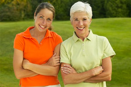 picture of mom and daughter playing golf - Mother and Daughter at Golf Course Stock Photo - Rights-Managed, Code: 700-00550073