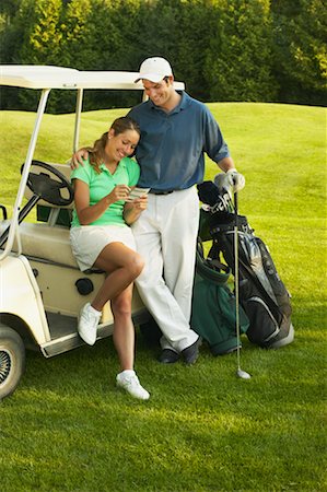 Couple at Golf Course Foto de stock - Direito Controlado, Número: 700-00550087