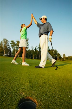 simsearch:600-02264571,k - Couple golf Photographie de stock - Rights-Managed, Code: 700-00550101