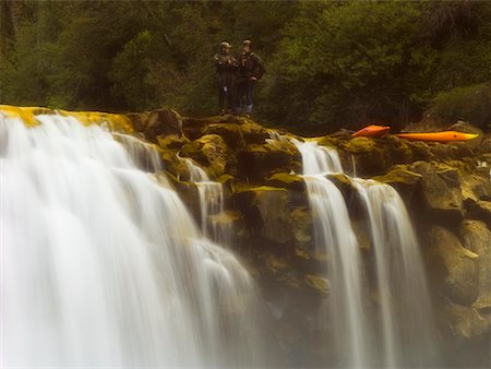 scenic and waterfall chile - Kayakers at Waterfall, Las Leonas, Neltume, Chile Stock Photo - Rights-Managed, Code: 700-00550297