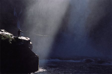 Angler at Huilo-Huilo Falls, Neltume, Chile Stock Photo - Rights-Managed, Code: 700-00550300