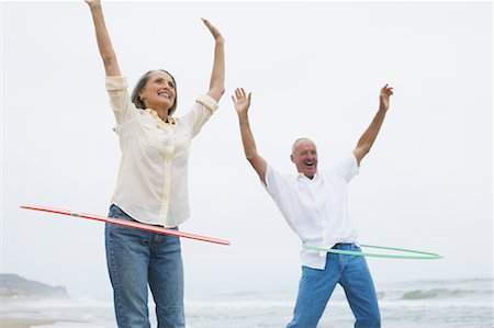 Couple Hula-Hooping Stock Photo - Rights-Managed, Code: 700-00550337