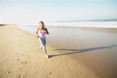 simsearch:700-00515320,k - Frauen am Strand läuft Stockbilder - Lizenzpflichtiges, Bildnummer: 700-00550494