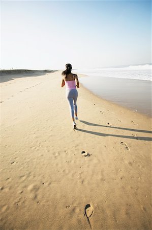 simsearch:700-00515320,k - Frauen am Strand läuft Stockbilder - Lizenzpflichtiges, Bildnummer: 700-00550495
