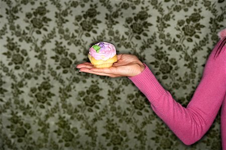 danish ethnicity (female) - Woman Holding Cupcake Stock Photo - Rights-Managed, Code: 700-00550569