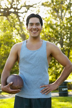 simsearch:700-00328588,k - Young Man Holding Football Stock Photo - Rights-Managed, Code: 700-00550589