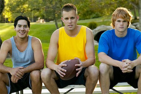 Three Young Men Sitting In Park Stock Photo - Rights-Managed, Code: 700-00550592