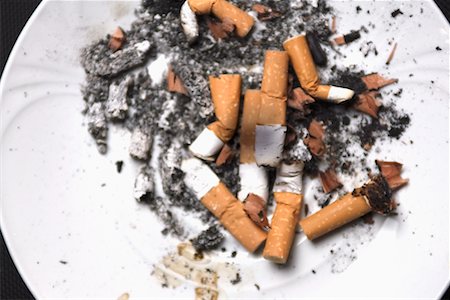 simsearch:700-01716553,k - Cigarette Butts on Plate Stock Photo - Rights-Managed, Code: 700-00550647