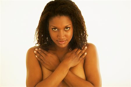 Portrait of Woman Covering Breasts Stock Photo - Rights-Managed, Code: 700-00550763