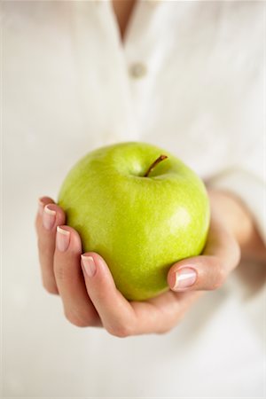 simsearch:700-00426102,k - Woman Holding Apple Stock Photo - Rights-Managed, Code: 700-00551100