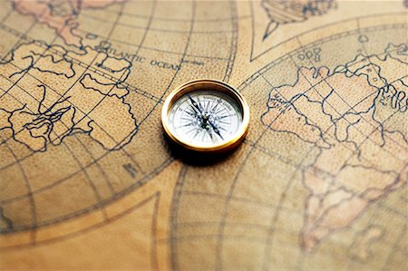 Compass and Old Fashioned Map Fotografie stock - Rights-Managed, Codice: 700-00551112
