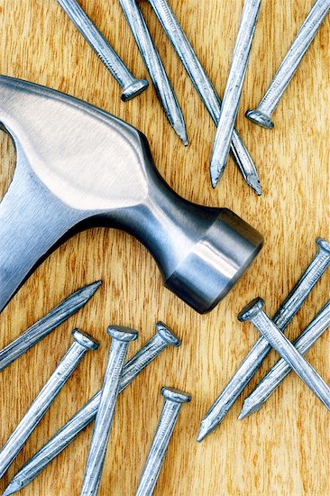 Close-Up of Hammer and Nails Stock Photo - Premium Rights-Managed, Artist: David Muir, Image code: 700-00551135
