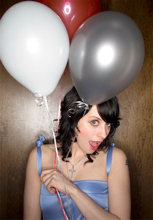 flirt women open mouth - Woman Holding Balloons Stock Photo - Rights-Managed, Code: 700-00551336