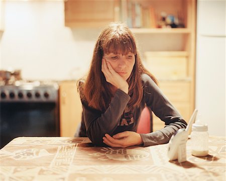 Woman Sitting by Baby Monitor Stock Photo - Rights-Managed, Code: 700-00551400