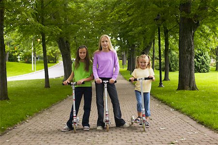 simsearch:700-00066767,k - Sisters with Scooters Stock Photo - Rights-Managed, Code: 700-00551433