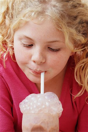 simsearch:700-00639623,k - Girl Blowing Bubbles into Milk Stock Photo - Rights-Managed, Code: 700-00552301