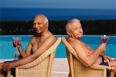 Portrait of Two Men By Swimming Pool, Holding Drinks Foto de stock - Con derechos protegidos, Código: 700-00552888