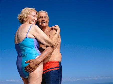 senior couple looking ahead - Couple Hugging, Man Touching Woman's Buttocks Stock Photo - Rights-Managed, Code: 700-00552922