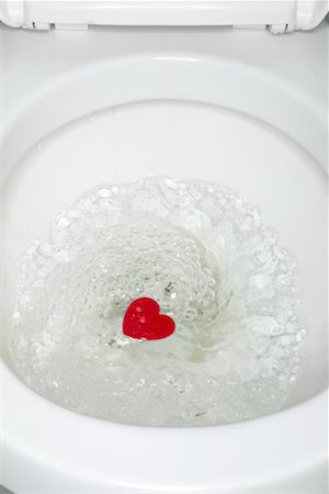 Heart Being Flushed down Toilet Stock Photo - Rights-Managed, Code: 700-00553699