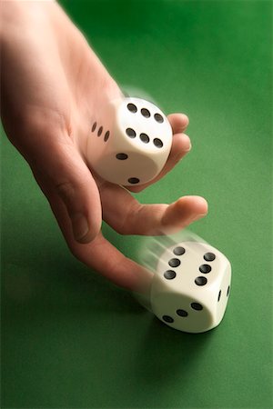 Hand Rolling Dice Stock Photo - Rights-Managed, Code: 700-00553871