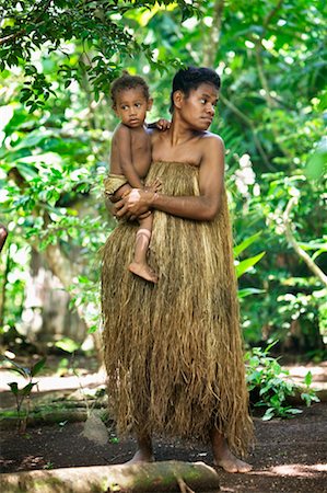 Woman and Child in Traditional Dress, Ekasup Cultural Village, Efate, Vanuatu Foto de stock - Direito Controlado, Número: 700-00553970