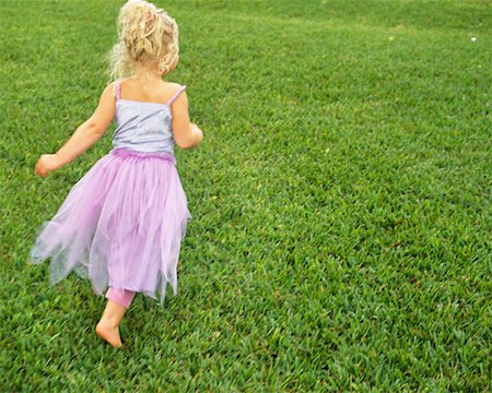 Girl Running on Grass Stock Photo - Rights-Managed, Code: 700-00560519