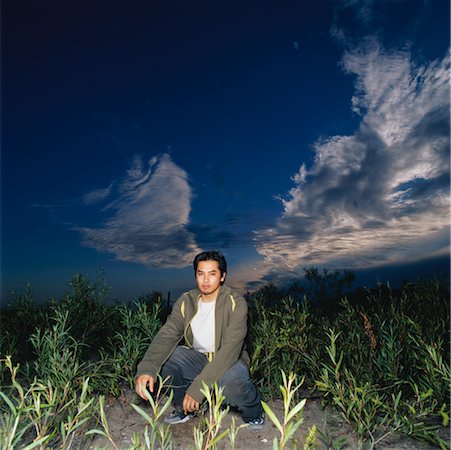 Portrait de jeune homme à l'extérieur Photographie de stock - Rights-Managed, Code: 700-00561368