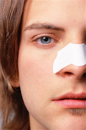 Man Using Acne Strip Stock Photo - Rights-Managed, Code: 700-00561797