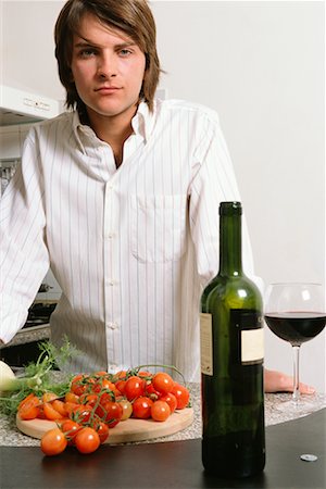Young Man Cooking Stock Photo - Rights-Managed, Code: 700-00561811