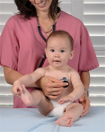 doctor examining boy baby - Baby at Doctor's Office Foto de stock - Con derechos protegidos, Código: 700-00588888