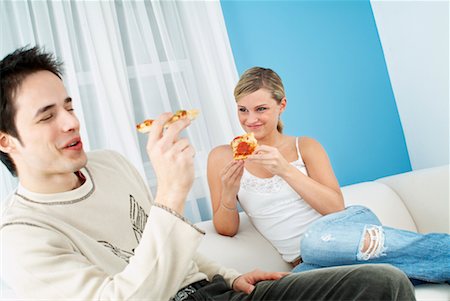 Young Couple Eating Pizza Foto de stock - Con derechos protegidos, Código: 700-00588915