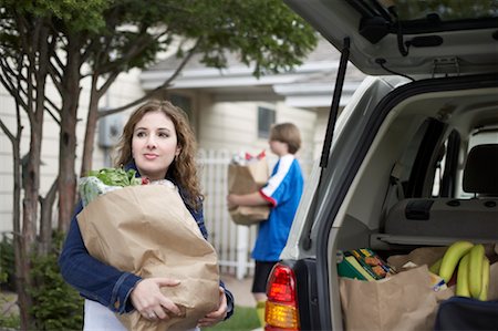 Mother and Son Unloading Groceries Stock Photo - Rights-Managed, Code: 700-00592500