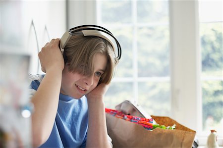 Boy Listening to Headphones Stock Photo - Rights-Managed, Code: 700-00592501