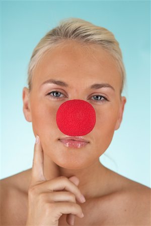 Portrait of Woman Wearing a Clown Nose Fotografie stock - Rights-Managed, Codice: 700-00592847