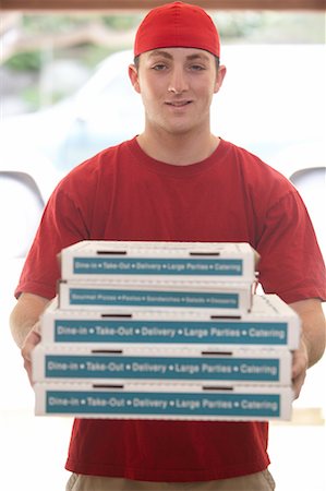 food delivery women - Teenager Delivering Pizza Stock Photo - Rights-Managed, Code: 700-00593000