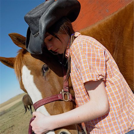 simsearch:614-06044165,k - Girl Hugging Her Pet Horse Foto de stock - Con derechos protegidos, Código: 700-00593045